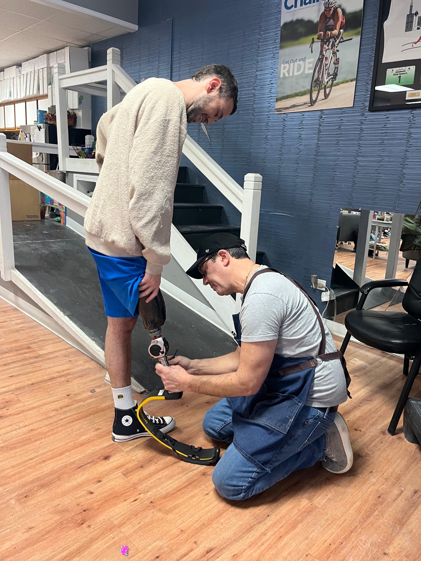A prosthetist fitting a new limb